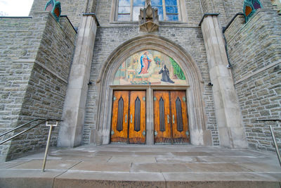 Entrance of temple against building