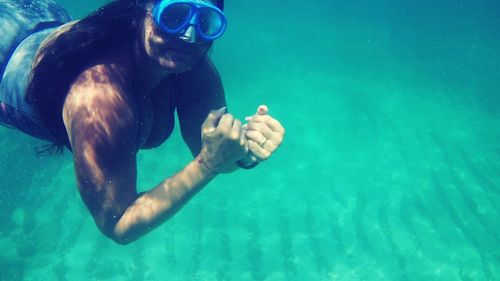 Man swimming in pool
