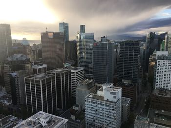 High angle view of buildings in city against sky