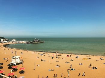 High angle view of beach against blue sky