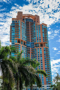 Low angle view of building against blue sky