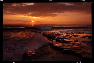 Scenic view of sea at sunset