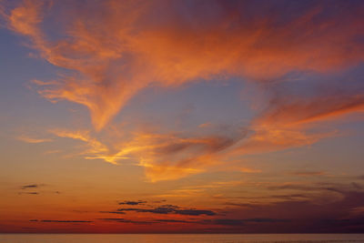 Low angle view of dramatic sky during sunset