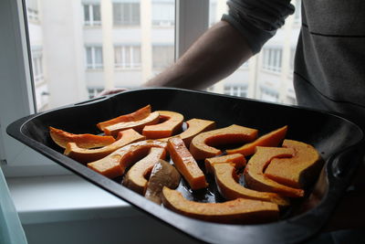 Close-up of sliced pumpkin in tray