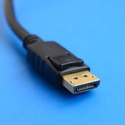 Close-up of usb cable on blue background
