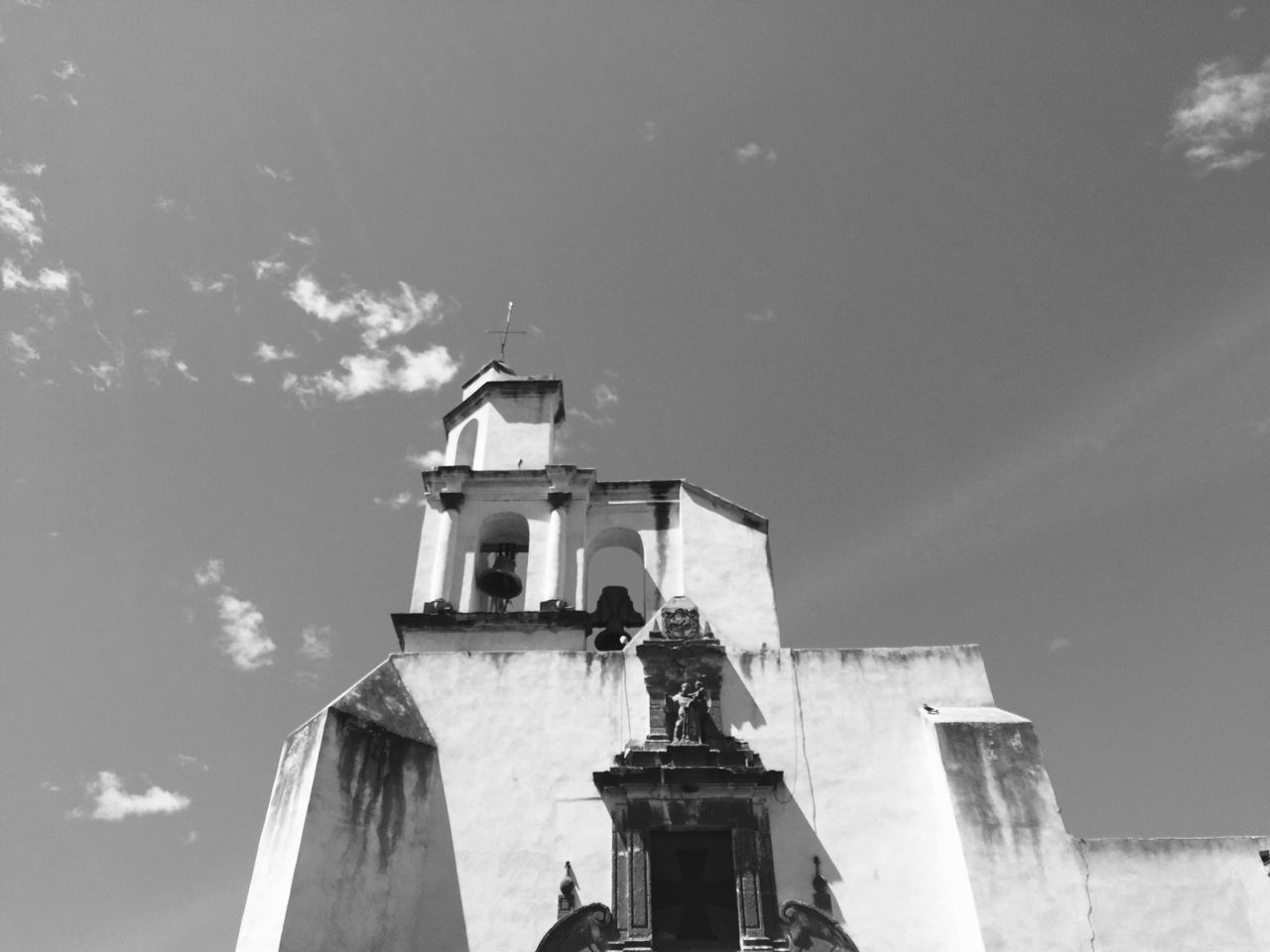 architecture, built structure, low angle view, building exterior, sky, high section, church, cloud, day, outdoors, cloud - sky, no people