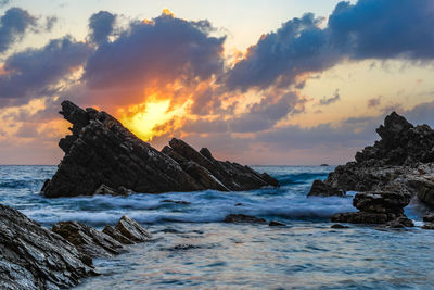 Scenic view of sea against sky during sunset