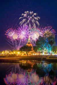 Firework display at night