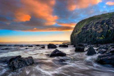 Scenic view of sea against sky during sunset