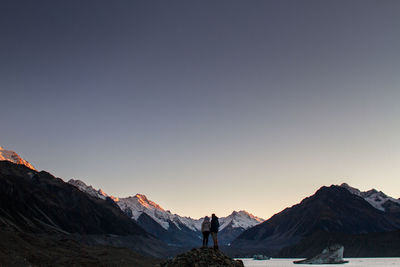 Scenic view of mountains against sky at sunset