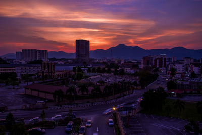 High angle view of city at sunset