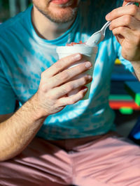 Getting a bite of a snow cone