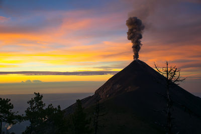 Acatenango volcano against sky during sunset