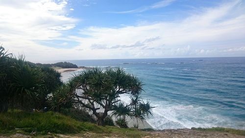 Scenic view of sea against cloudy sky