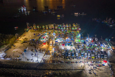 High angle view of illuminated street at night