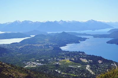 High angle view of landscape and mountains against clear sky