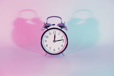 Close-up of clock on table