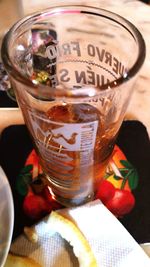 Close-up of beer glass on table