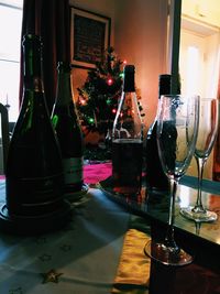 Close-up of wine bottles on table