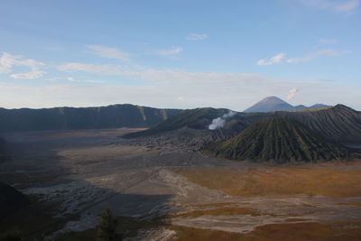 Scenic view of volcanic landscape against sky