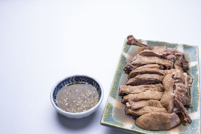 High angle view of cookies in bowl on table