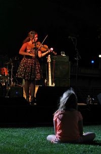 Woman enjoying music concert