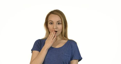 Portrait of a beautiful young woman over white background