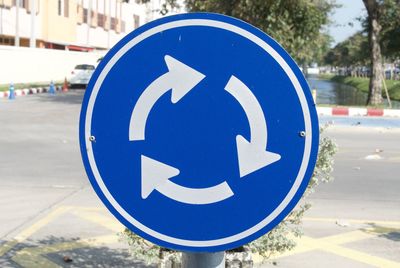 Close-up of road sign on street