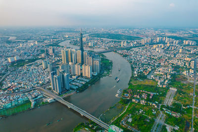 High angle view of river amidst buildings in city