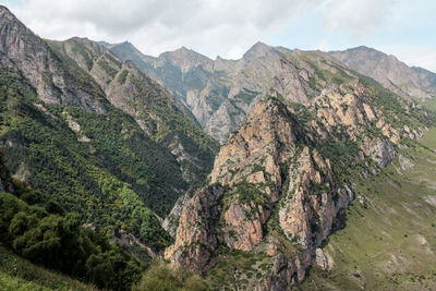 Scenic view of rocky mountains against sky