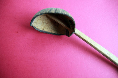 Close-up of bread on pink background