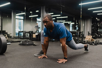 Man exercising in gym