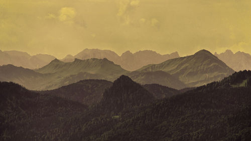 Scenic view of mountains against sky during sunset