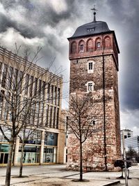 Building against cloudy sky