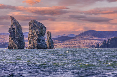 Three brothers rocks in avacha bay on kamchatka peninsula