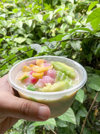 Close-up of hand holding food