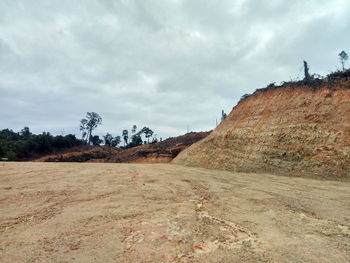 Scenic view of land against sky