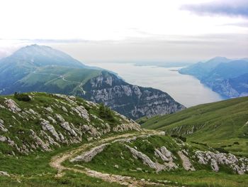 Scenic view of landscape and mountains against sky