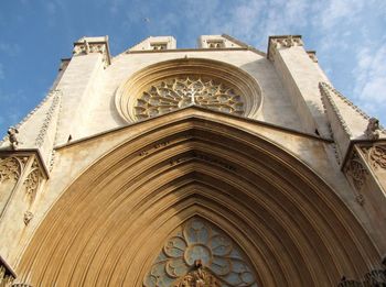 Low angle view of tarragona cathedral against sky