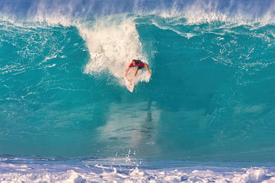 Person swimming in sea