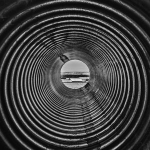 Directly below shot of spiral staircase in tunnel