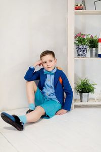 Portrait of boy sitting