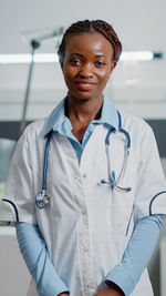 Portrait of doctor standing in hospital