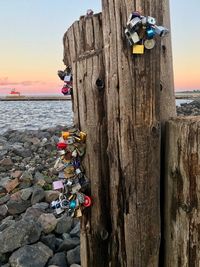 Close-up of padlocks on beach