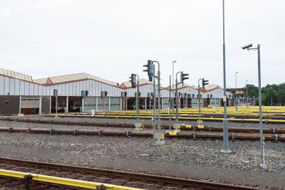 Train on railroad track against sky