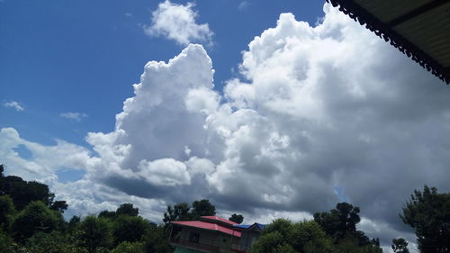 High section of building against cloudy sky