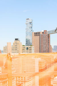 Modern buildings against clear sky