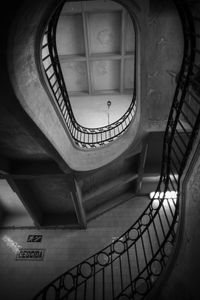 Directly below shot of spiral staircase in building