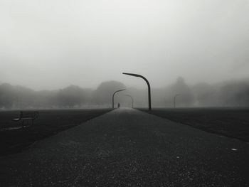 Road against sky during foggy weather