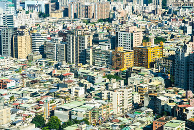 High angle view of modern buildings in city